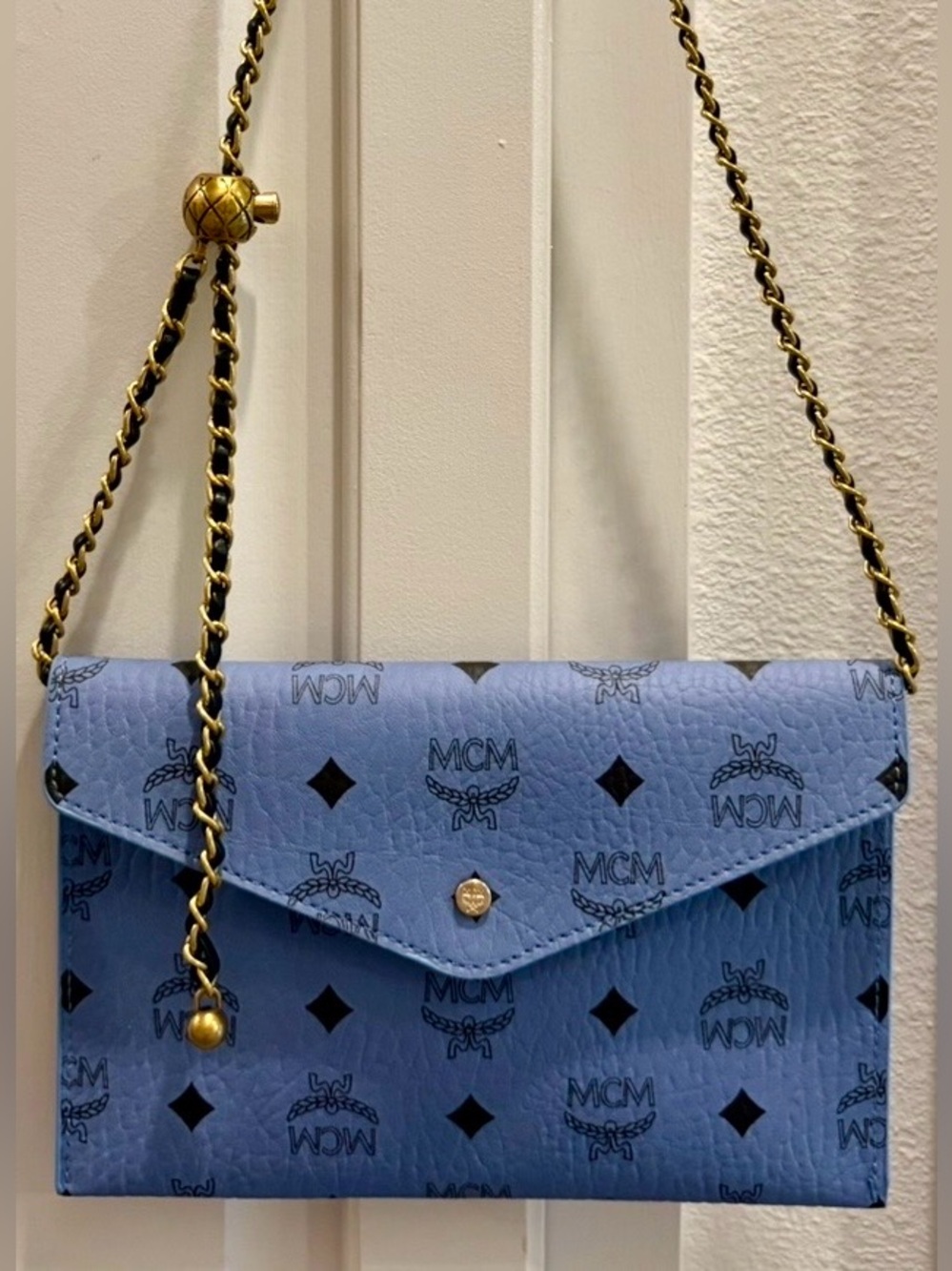 NIB MCM Sky Blue Logo Envelope Clutch/Crossbody. Includes a balled chain + more